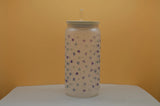 Wrap-around blue floral design on frosted 16oz beer can glass featuring small blue flowers