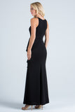 Embellished neck and ruffle detailed crepe gown.