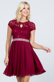 Lace and wool dobby, cap sleeve, fit and flare dress with waist embellishment.