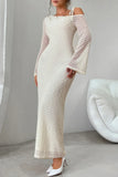 Woman wearing a long, off-shoulder, white sequin dress in a minimalistic setting.