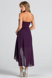 Open back Lace and chiffon surplus dress with waist brooch.
